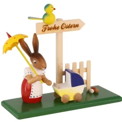 Osterhäsin mit Kinderwagen.